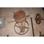 A vintage bean drill and a small sieve