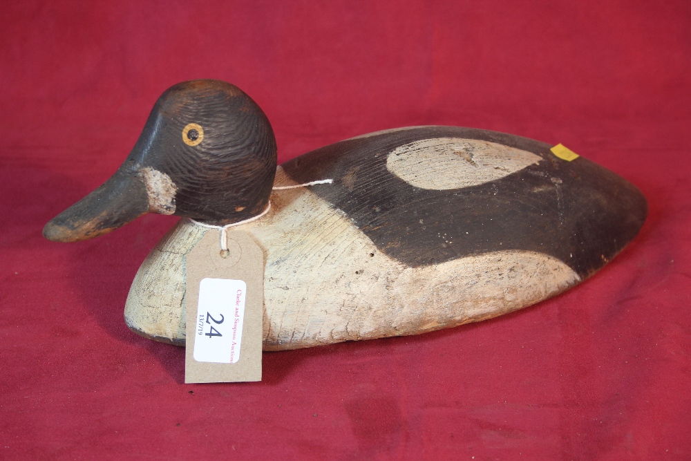 A wooden decoy duck, 30cm long