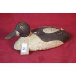 A wooden decoy duck, 30cm long