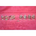 A collection of Zinnfiguren type flat painted model soldiers to include