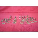 A collection of Zinnfiguren type flat painted model soldiers to include