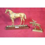 Two brass horse ornaments