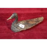 A wooden decoy duck, 34cm long