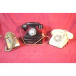 A vintage black telephone with integral pull out n