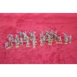 A collection of Zinnfiguren type flat painted model soldiers to include