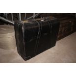 A black leather travelling case