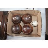 A set of Lignum Vitae and bone inlaid bowling wood