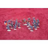 A collection of Zinnfiguren type flat painted model soldiers to include