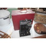 A vintage Specto Ltd. projector and box