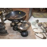 A set of cast iron kitchen scales and weights by Young & Sons