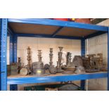 A large quantity of Victorian brass candlesticks,