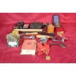 A box containing miscellaneous items including a p