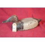 A wooden decoy duck, 38cm long