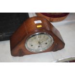 An oak Art Deco chiming mantel clock