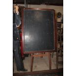 An early 20th Century pine blackboard and easel