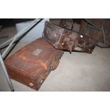 Two vintage leather suitcases