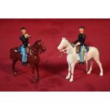 Two Britains lead horse mounted soldiers