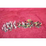 A collection of Zinnfiguren type flat painted model soldiers to include