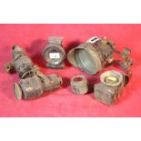 A collection of vintage cycle carbide lamps etc.