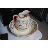 A Victorian pottery jug and basin set