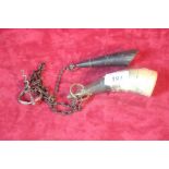 A 19th Century novelty corkscrew chained to two cow horns
