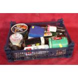 A box containing mostly motor cleaning items, wax,