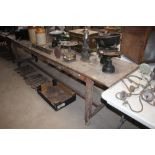 An antique pine kitchen table, raised on square se