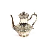 A Victorian plated coffee pot, with foliate engraved decoration, 25cm high