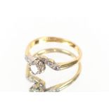 An 18ct gold and platinum diamond ring