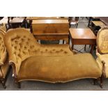 A Victorian carved rosewood framed chaise longe, with Dralon buttoned upholstery, the serpentine