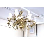 A Dutch style brass 8 branch chandelier