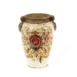 A large antique French pottery baluster vase, decorated with a central armorial surrounded by