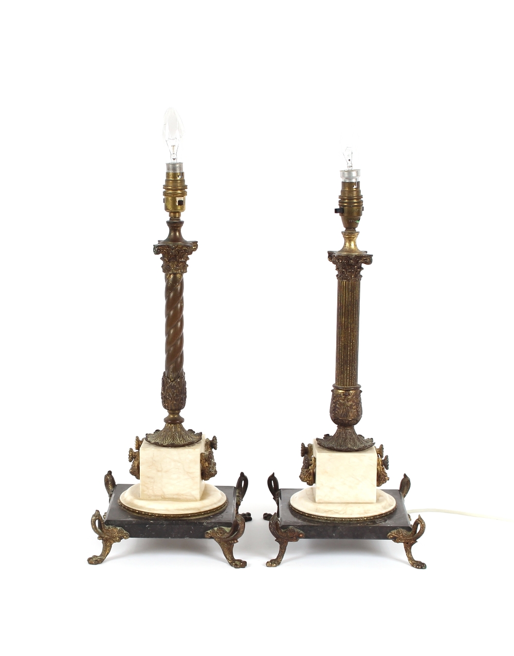 A bronze and onyx Corinthian column table lamp, having applied swag decoration raised on a square