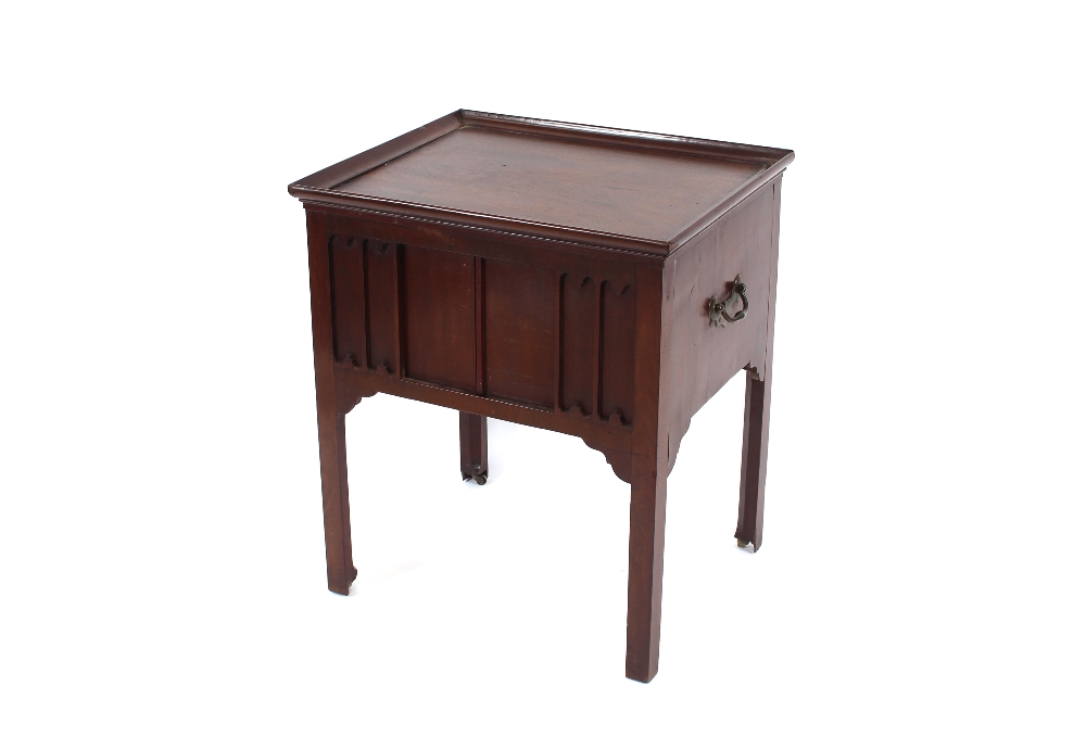 A George III mahogany tray top bedside commode, fitted sliding doors, raised on square section