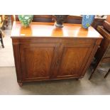 A 19th Century mahogany side cupboard, the interior shelf enclosed by a pair of moulded panelled