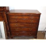 A 19th Century mahogany secretaire chest, the writing drawer fitted pigeon-holes and small drawers