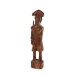 A carved wooden trench art figure of a soldier, 9cm high