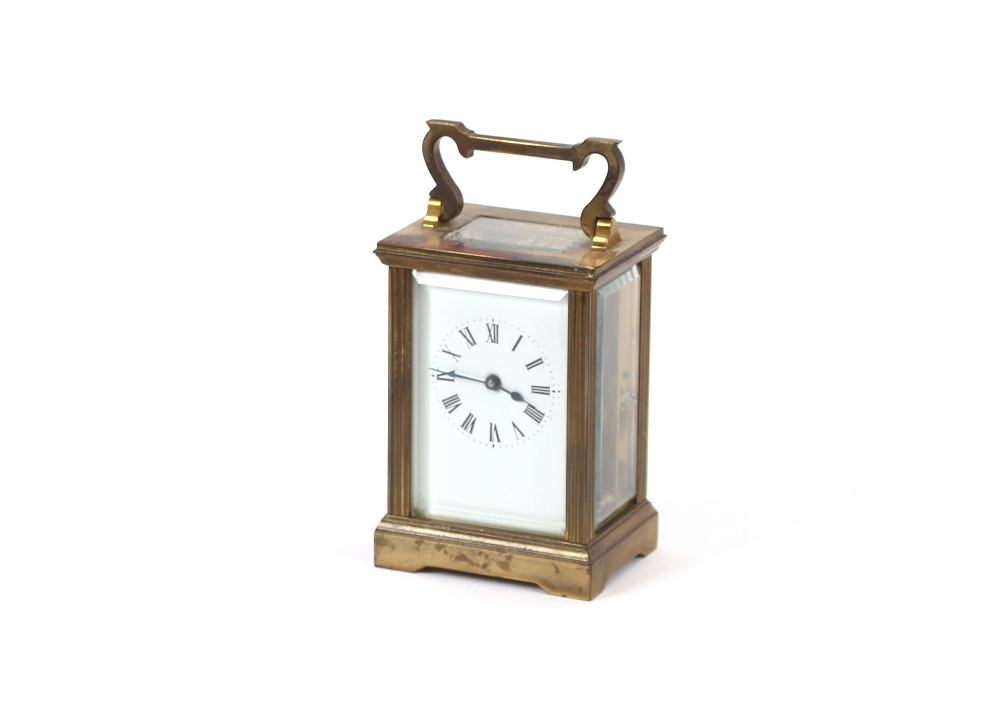 A brass cased carriage timepiece, having white enamel Roman numeral dial