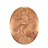 A late 19th/early 20th Century Indian copper plaque, depicting Shiva dancing upon a demon with