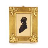 A 19th Century silhouette profile, of a gentleman, contained in decorative gilt frame