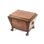 A 19th Century mahogany sarcophagus shaped wine cooler, the stepped hinged lid opening to reveal a