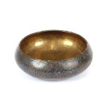 A Kashmir papier maché and brass lined bowl, 25cm dia.