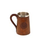 A late 19th Century treen military tankard, for the Indian Engineers, having silver plated liner and