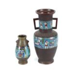 A bronze and cloisonné decorated baluster vase, flanked by angular handles, bands of decoration