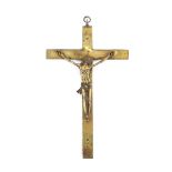 A yellow metal crucifix, 21cm long