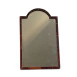 A domed top tortoiseshell framed easel mirror, with bevel edged plate, 45cm high x 28cm wide