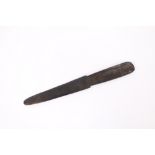 A 19th Century carved wooden lime spatula, probably Oceanic, 36cm long