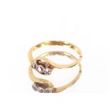 A 18ct gold three stone diamond ring