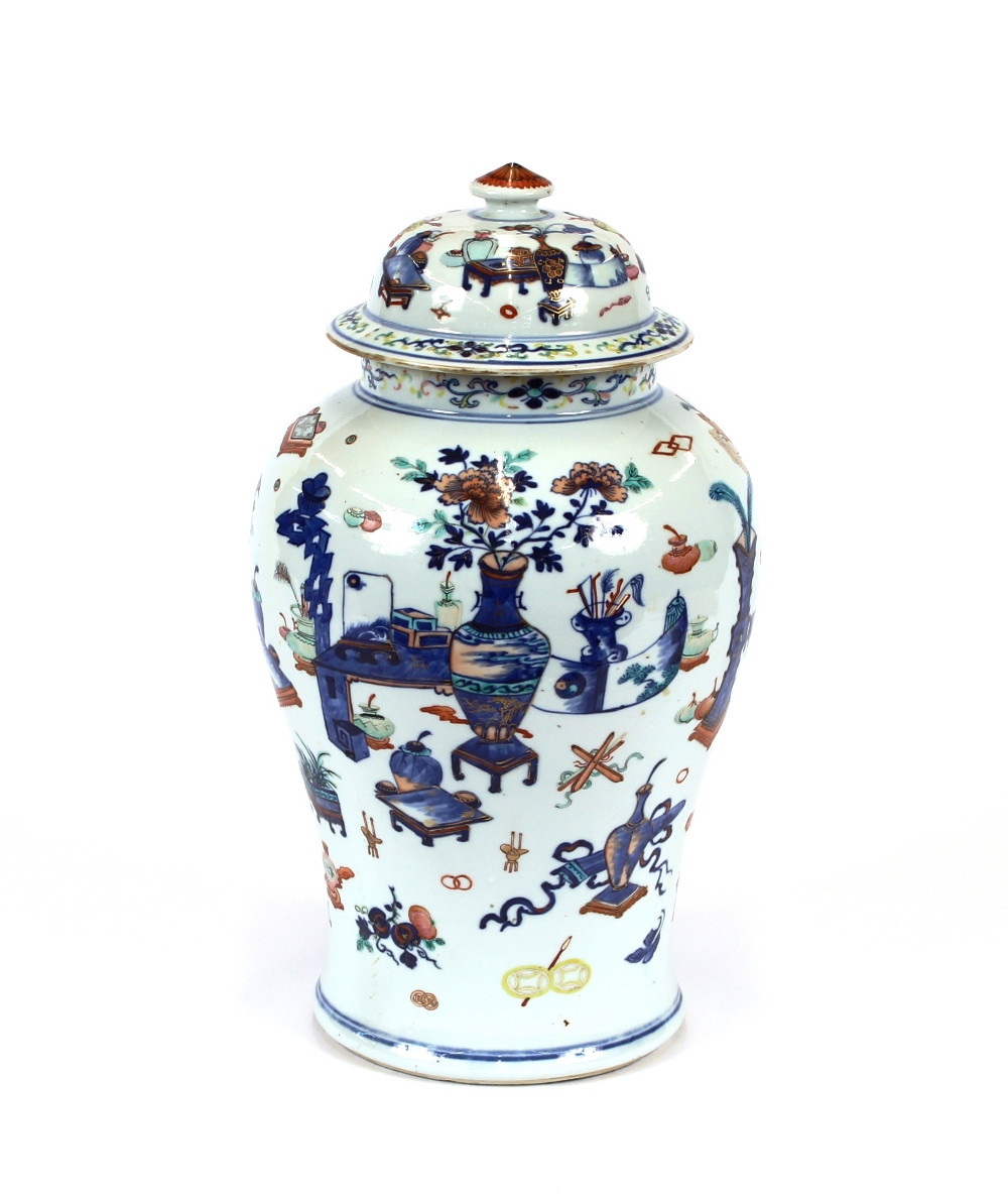 A 19th Century Chinese baluster vase and cover, decorated all over with objects and antiquities,