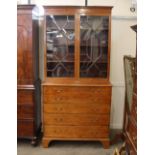 A George III mahogany cross-banded and satinwood strung secretaire bookcase, the upper adjustable